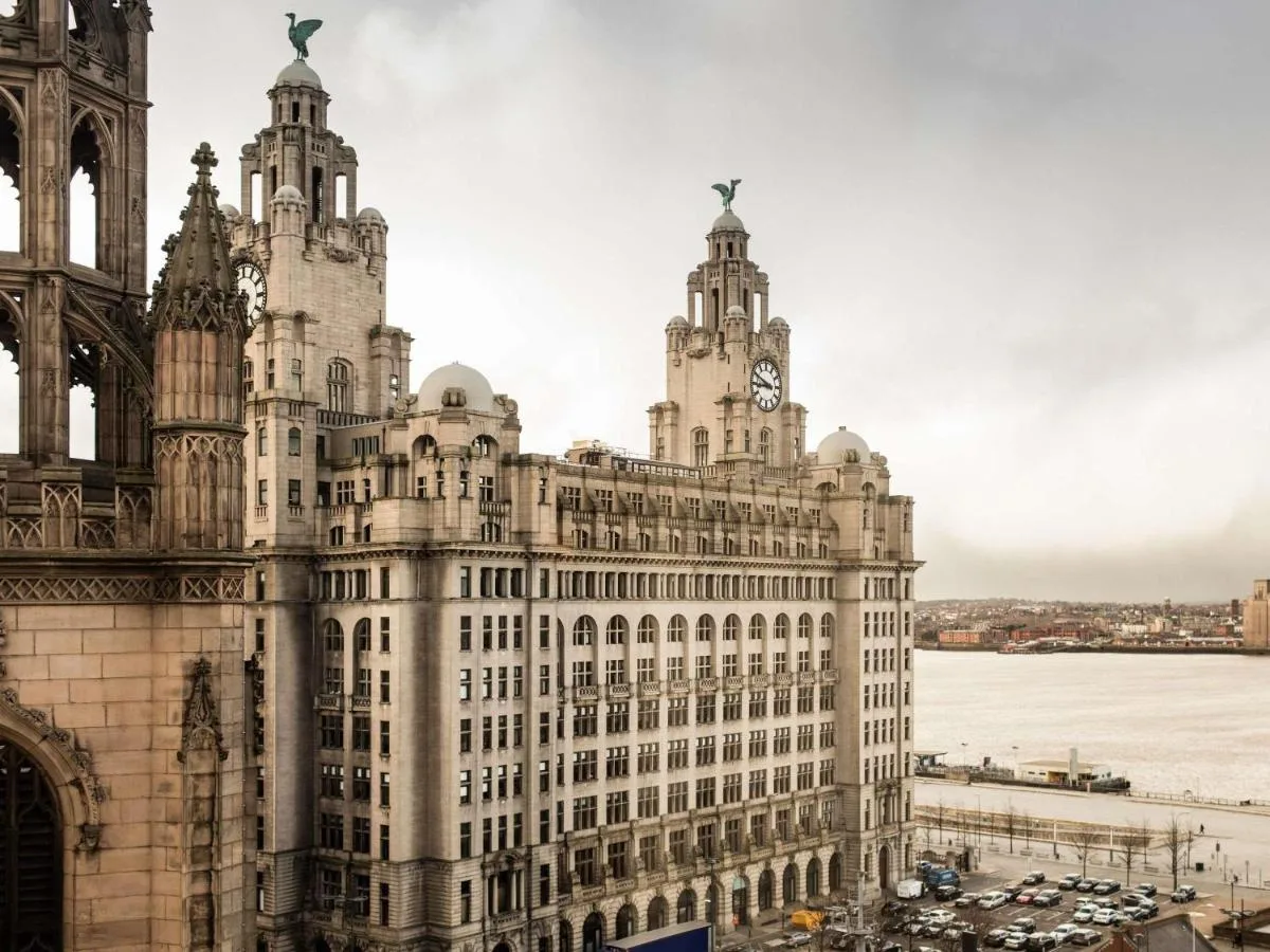 A building with a clock tower near ibis Liverpool Centre Albert Dock – Liverpool One in Liverpool